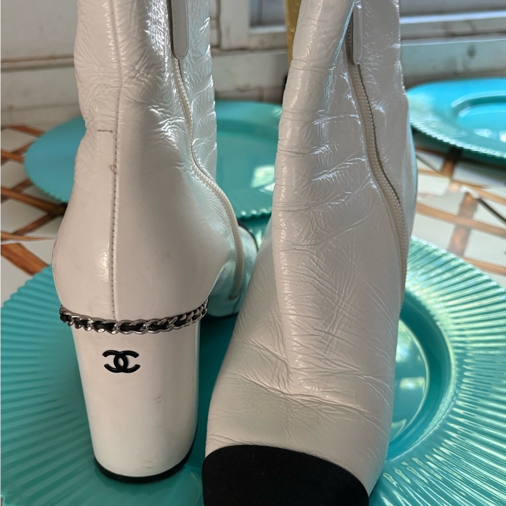 CHANEL White and Black Heeled Boots with Chain Detail